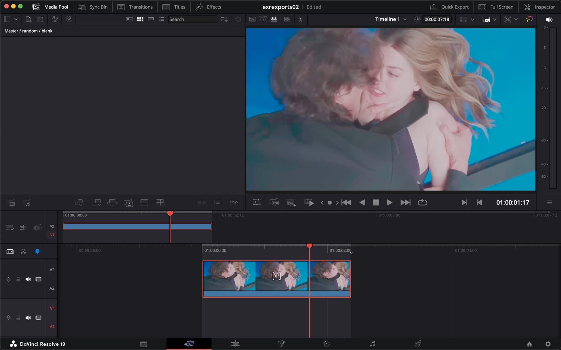 A shot in the DaVinci Resolve viewer with no ACES Input Transform set. The image is milky and low in contrast, and the blue background has gone pale teal — the washed-out look of log footage.